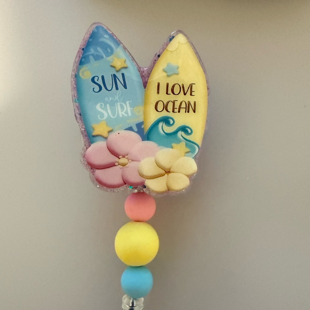 Badge Reel.  Sun and Surf I Love Ocean Surfboard  - Pastel‎ Pink Yellow Blue